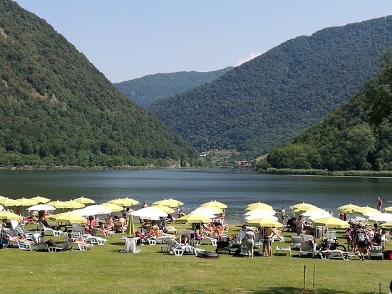 Lake Segrino lido with parasols
